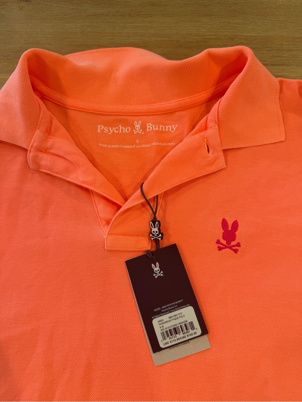 Psycho Bunny men’s pique polo neon orange NWT